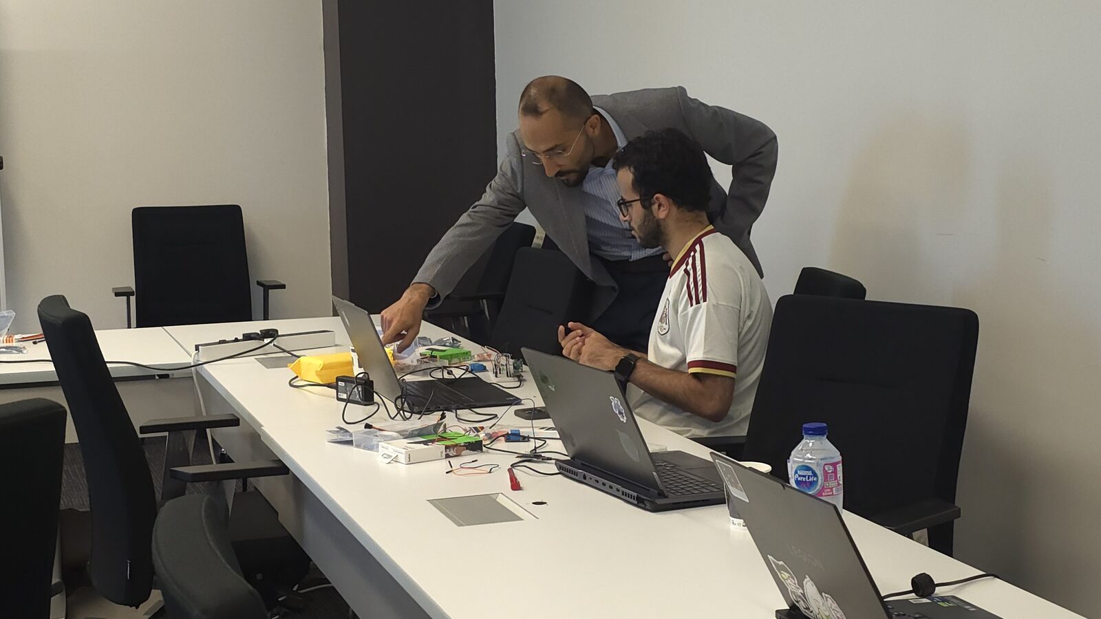 Guiding a student through an ESP32 build during a lab session